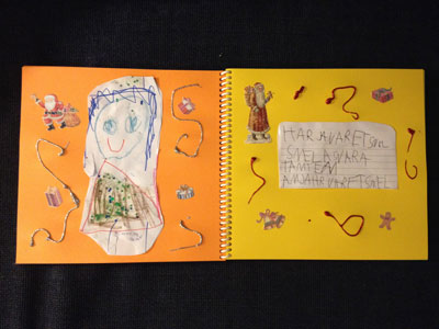 scrapbook med barnens teckningar
